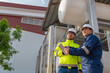 © reewungjunerr - Engineers and supervisor work place to keep liquid helium,preventive maintenance schedule checking,Thailand people,Consult technical problems