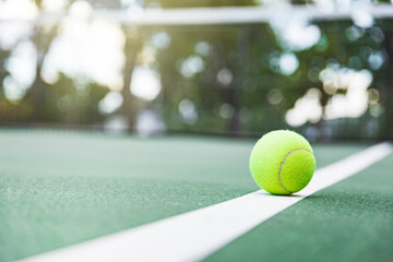 Wall Mural - Tennis ball on the court with copy space for your text