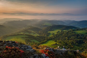 Poster - View colorful sunrise of the autumn landscape with forests and pastures with cattle. The White Carpathian Mountains, Slovakia, Europe.