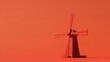 Red windmill on orange background. Minimal concept