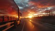 a truck driving down a highway at sunset