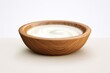 Bowl of fresh creamy milk on a clean background