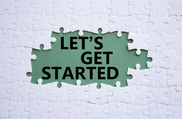 Wall Mural - lets get started symbol. concept words lets get started on white puzzle. beautiful grey green backgr