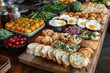 Elaborate brunch spread featuring various breads, croissants, eggs, yogurt, and fresh vegetables on a rustic wooden table.
