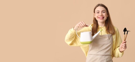 Sticker - Happy young woman with watering can and gardening tools on beige background with space for text