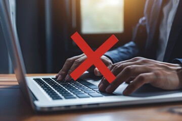 Person working on a laptop with a prohibitory sign, concept of internet restrictions or cyber security...