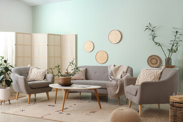 Wall Mural - Interior of stylish living room with bamboo plant