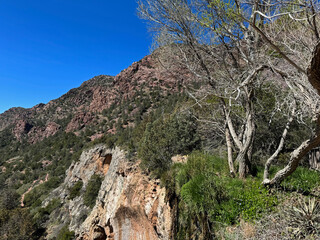 springtime view of the red rocky mountain landscape in tonto natural bridge state park in pine, ariz