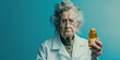 © RealPeopleStudio - Ugly evil old woman doctor furious with the patient on blue background. holding a bottle of pills in his hands.