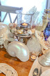 Seashell and candle decoration on a nautical table setting with natural colors