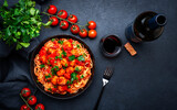 Fototapeta Na sufit - Italian spaghetti in bolognese sauce with meatballs, black table background, top view