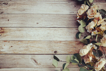 Canvas Print - Beautiful pink flowers decoration with space for text message flat lay on wooden background