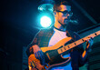 © PEDROMERINO - Bass Player In Stage With Colorful Lights