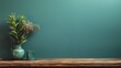 Potted plant next to ceramic cup on wooden shelf against teal wall