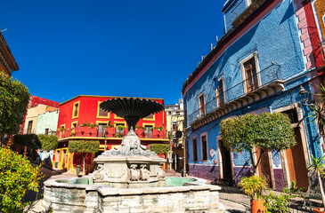 Wall Mural - Fountain in Baratillo Square in the old town of Guanajuato, UNESCO world heritage in Mexico