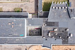 roof of industrial building before renovation. aerial top view from flying drone.