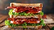 A classic BLT sandwich stacked high with crispy bacon, lettuce, and tomato