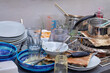 Chaotic Kitchen: Dirty Dishes and Cluttered Countertop