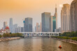 Sunset over modern office buildings at the Haihe River in Tianjin, China