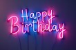 © Larisa - Neon sign with the words 'Happy Birthday' in bright pink and blue lights.