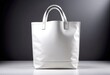 Presenting a modern white tote bag against a minimalistic grey background, exuding professionalism and style 