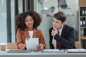 Wall Mural - Lawyer or judge consult, Two female lawyers discussing about contract and agreement concept.