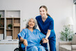 © Nuttapong punna - Nurse helping elderly woman walk in the room, holding his hand, supporting. Treatment and rehabilitation after injury in assisted living facility, senior care .