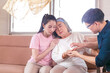 Middle-aged son and daughter take care of a sick senior mother, Asian family concepts