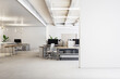 © Who is Danny - Modern office setting with industrial elements and white wall for mockups. 3D Rendering