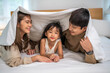 Portrait of enjoy happy love asian family father and mother holding hug cute little asian girl child smiling play and having fun moments good time, care, kid, support, insurance, child, at home