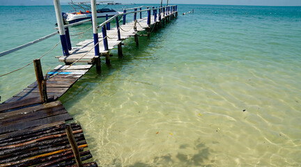 Wall Mural - wooden jetty on starfish beach