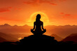 © Olexandra - Silhouette of a woman in the lotus position meditating at sunset in the mountains.