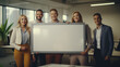 © Neha - Young businesspeople or office staff showing blank board