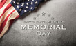 Happy memorial day concept made from American flag and the text on dark stone background.