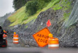 Abrupt Edge road sign along the mountain road. Landslide erosion disaster on the roadside. Alaska. USA.