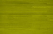 Horizontale Holzbretter gelb grün als Hintergrund mit Textfreiraum