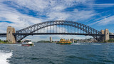 Fototapeta  - Sydney, New South Wales, Australia: View of Sydney Harbour Bridge and ferry boats