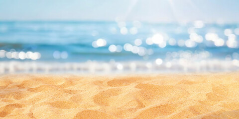 Wall Mural - blurred defocused natural background of tropical summer beach with sparkling reflections on the wate