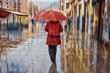 People with an umbrella in rainy days in Bilbao, basque country, spain