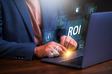 Return on investment (ROI) , Businessman using a sofware to analysis investment to get high  return.