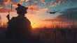 A soldier in military uniform sits on the grass and controls a modern military combat drone at sunset. The concept of smart warfare