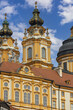 View of Melk Abbey with Collegiate Church towers on background of blue sky, Melk, Austria
