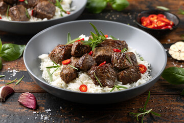 Wall Mural - Garlic butter beef steak bites with rice