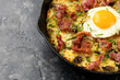 A British Classic, Bubble and Squeak baked with mashed potatoes with cabbage, bacon and eggs