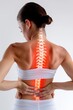 Woman in pain from spine issues like osteoporosis, degeneration, cancer, or disc disease