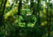 3D green glass recycling symbol amidst a forest