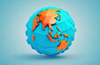 A low poly globe with an electric blue map of the world on it. The font and design give it an artistic and fashionable accessory look