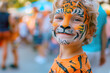 Cute little boy with tiger aqua makeup