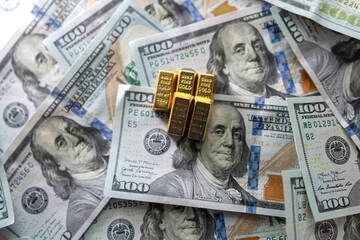 Wall Mural - US paper dollars money with gold bars, financial saving background