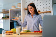 Beautiful young woman is preparing healthy food in the kitchen. Diet, healthy lifestyle concept